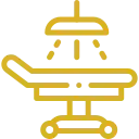 Icono dorado quirófano Icono dorado de una mesa de quirófano para realizar cirugías